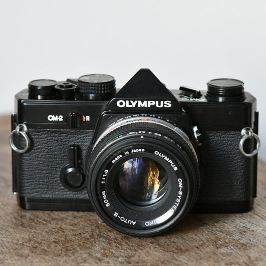 Olympus OM-2 Black 35mm Film SLR Camera + 50mm f/1.8 Lens Kit - New Light Seals