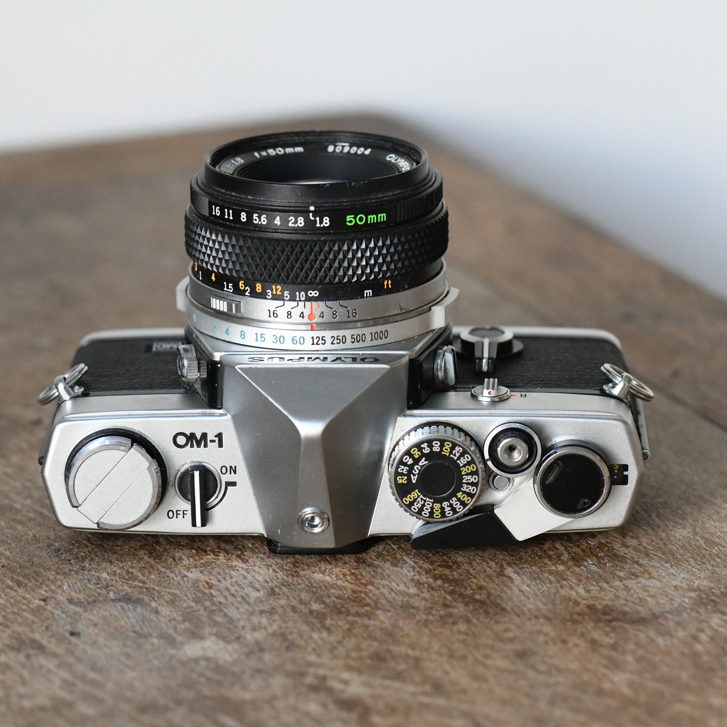 Olympus OM-1 MD Silver 35mm Film SLR Camera + 50mm F1.8 Lens - New Light Seals