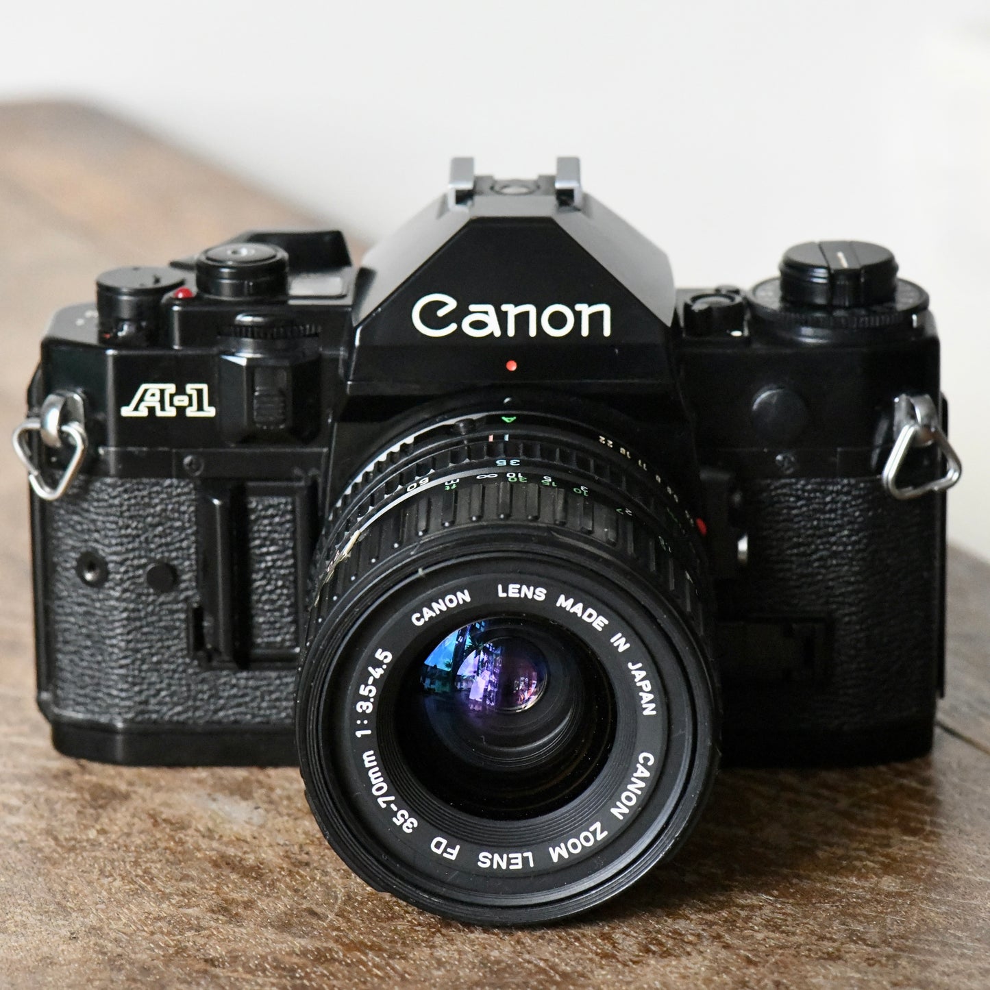 Canon A-1 35mm SLR Film Camera + 35-70mm f/3.5-4.5 Lens Kit - New Light Seals