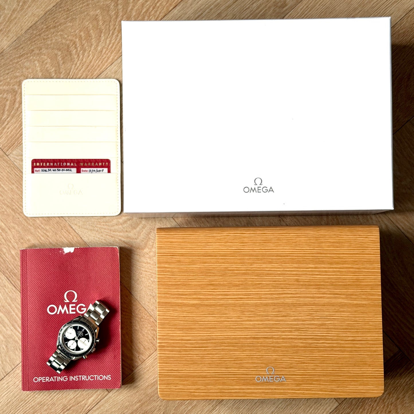 Omega Speedmaster Racing Reverse Panda 2017 Co-Axial Chronograph - Box & Papers